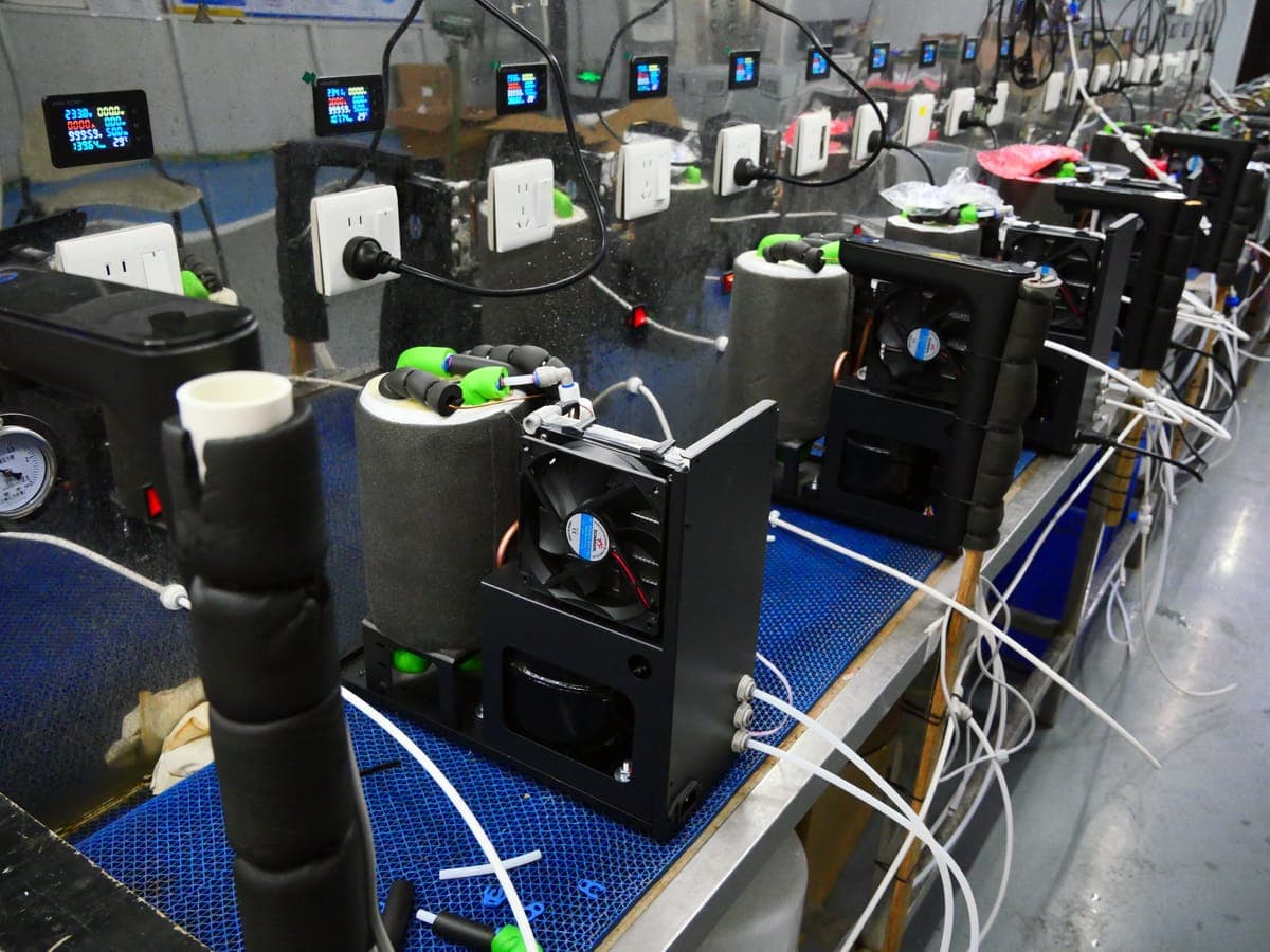 Water leak test station — each unit pressurized and monitored before packing